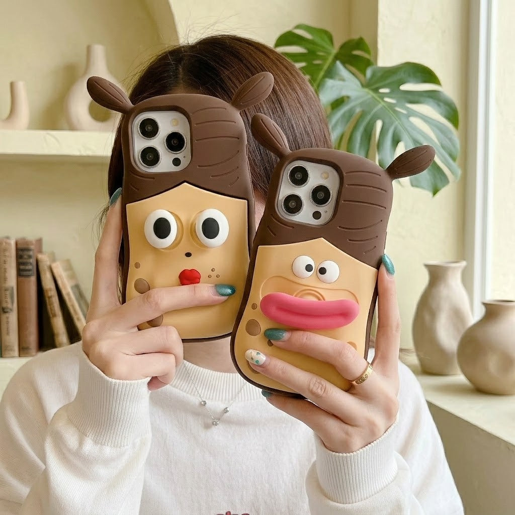 A hand interacting with the squishy face of the phone case